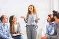 Young woman telling how she overcame drug addiction at group meeting Royalty Free Stock Photo