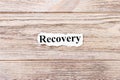 Recovery of the word on paper. concept. Words of Recovery on a wooden background Royalty Free Stock Photo