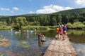 Recreating people near the riverside of river Semois, Belgium