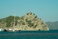 Recreation on the boat near the shore of a mountain. Ship on the water. summer vacation travelling Royalty Free Stock Photo