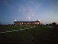 recreation center in the summer. Sapboard, river and reeds, sunset or sunrise. Royalty Free Stock Photo