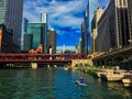 Recreation on the Chicago River, including kayaking, pedestrian walkway, fishing piers, surrounded by