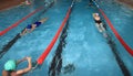 Recreation groups of women swimming in indoor public swimming p