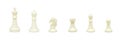 Row of set of six white chess pieces figurines standing on white background. Royalty Free Stock Photo