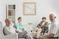 Recreation room with seniors Royalty Free Stock Photo