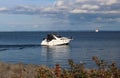 Recreation vessel sailing away from the marina - Thunder Bay Marina, Ontario, Canada Royalty Free Stock Photo
