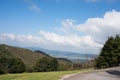 Recreational area near Oviedo. Empty road and nature around. Trees and mountains, sunny day, no people. Asturias Royalty Free Stock Photo