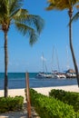 Recreational boats at white sand beach by Caribbean sea in Cancun, Mexico Royalty Free Stock Photo