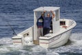 Recreational fishermen crossing New Bedford harbor