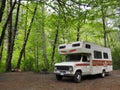 Recreational Vehicle Camping in Lush Green Forest