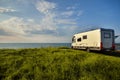 Recreational vehicle in a meadow Royalty Free Stock Photo