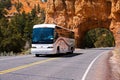 Recreational vehicle traveling through Red Arch, Bryce Canyon, Utah, USA