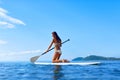 Recreational Water Sports. Woman Paddling On Surf Board. Summer Royalty Free Stock Photo