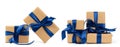 Rectangle box wrapped in brown kraft paper and tied with a silk blue ribbon
