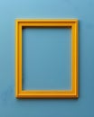 A rectangle picture frame in electric blue hangs on azure wall Royalty Free Stock Photo