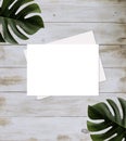 Rectangle white card mockup flat lay with leaves