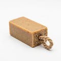 Rectangular bar of soap with a natural, speckled brown color. The texture is slightly Royalty Free Stock Photo