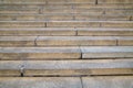 Rectangular beige granite steps on a clear sunny day, texture backgrounds for graphic design. Abstract