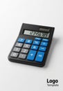 A rectangular, black calculator with blue Royalty Free Stock Photo
