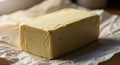 A rectangular block of butter is Royalty Free Stock Photo