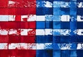 Rectangular blocks are arranged in a grid pattern, painted with red, white, and blue colors, resembling a national flag. Royalty Free Stock Photo