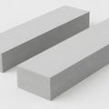 Rectangular blocks with textured surface on white background for various industrial applications Royalty Free Stock Photo