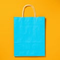 Rectangular blue paper bag on a yellow background