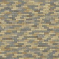 Rectangular bricks in shades of light beige, gray, and brown are arranged in a stagger Royalty Free Stock Photo