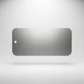 Rectangular brushed metal tag with rounded corners and a small circular hole on the left side. The Royalty Free Stock Photo