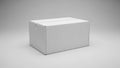 Cardboard box with a plain white exterior on a smooth neutral gray Royalty Free Stock Photo