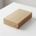 A rectangular cardboard box sits on a white surface. The box is Royalty Free Stock Photo