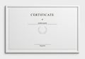 Rectangular certificate with a minimalistic design. The word \