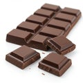 Rectangular dark chocolate bar with multiple square segments, arranged on a white Royalty Free Stock Photo