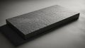 Rectangular dark grey slate stone slab on a grey concrete surface Royalty Free Stock Photo