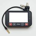 Rectangular electronic device with a screen, resembling a diagnostic tool or gauge Royalty Free Stock Photo
