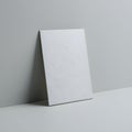 Rectangular object with sharp edge and raised top against gray background Royalty Free Stock Photo