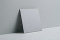 Rectangular object with sharp edge and raised top against gray background Royalty Free Stock Photo