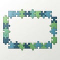 Rectangular frame made of interlocking jigsaw puzzle pieces in various shades of Royalty Free Stock Photo