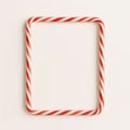 Rectangular frame made from red and white striped candy canes carefully aligned on white background festive christmas border Royalty Free Stock Photo
