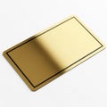A rectangular gold-colored metallic object with a reflective surface and a black border Royalty Free Stock Photo
