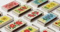 Rectangular matchboxes are arranged in a diagonal pattern on a light surface. Each Royalty Free Stock Photo