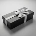 Rectangular, matte black gift box adorned with a smooth, glossy white Royalty Free Stock Photo