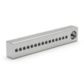 A rectangular metal object with multiple small holes and one large hole for installation Royalty Free Stock Photo