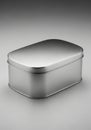 Rectangular metal tin box with a brushed steel finish. It has smooth, rounded edges Royalty Free Stock Photo