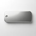 Rectangular metallic dog tag with rounded edges on a white surface. It features a brushed texture Royalty Free Stock Photo