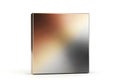 A rectangular metallic object with a reflective surface showcasing a gradient of warm and cool tones Royalty Free Stock Photo