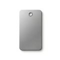 Rectangular metallic tag with rounded corners on a white background. It features a brushed steel Royalty Free Stock Photo