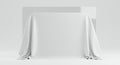 A rectangular object is covered with a smooth, white fabric in a minimalist setting. Royalty Free Stock Photo