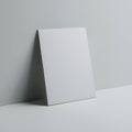 Rectangular object with sharp edge and raised top against gray background Royalty Free Stock Photo