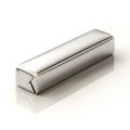 Sleek Silver Wrapped Rectangular Object on Reflective Surface metallic shiny Royalty Free Stock Photo